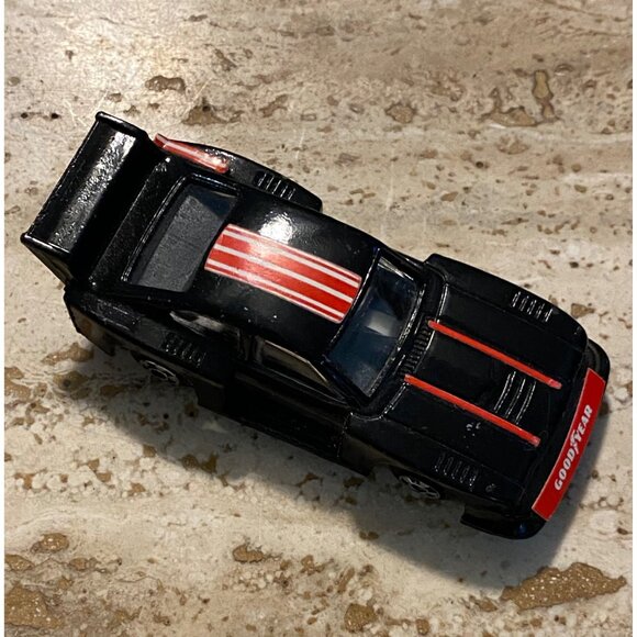 Vintage 1977 Ford Capri Toy Car Black With Red Stripes Goodyear - Picture 2 of 6